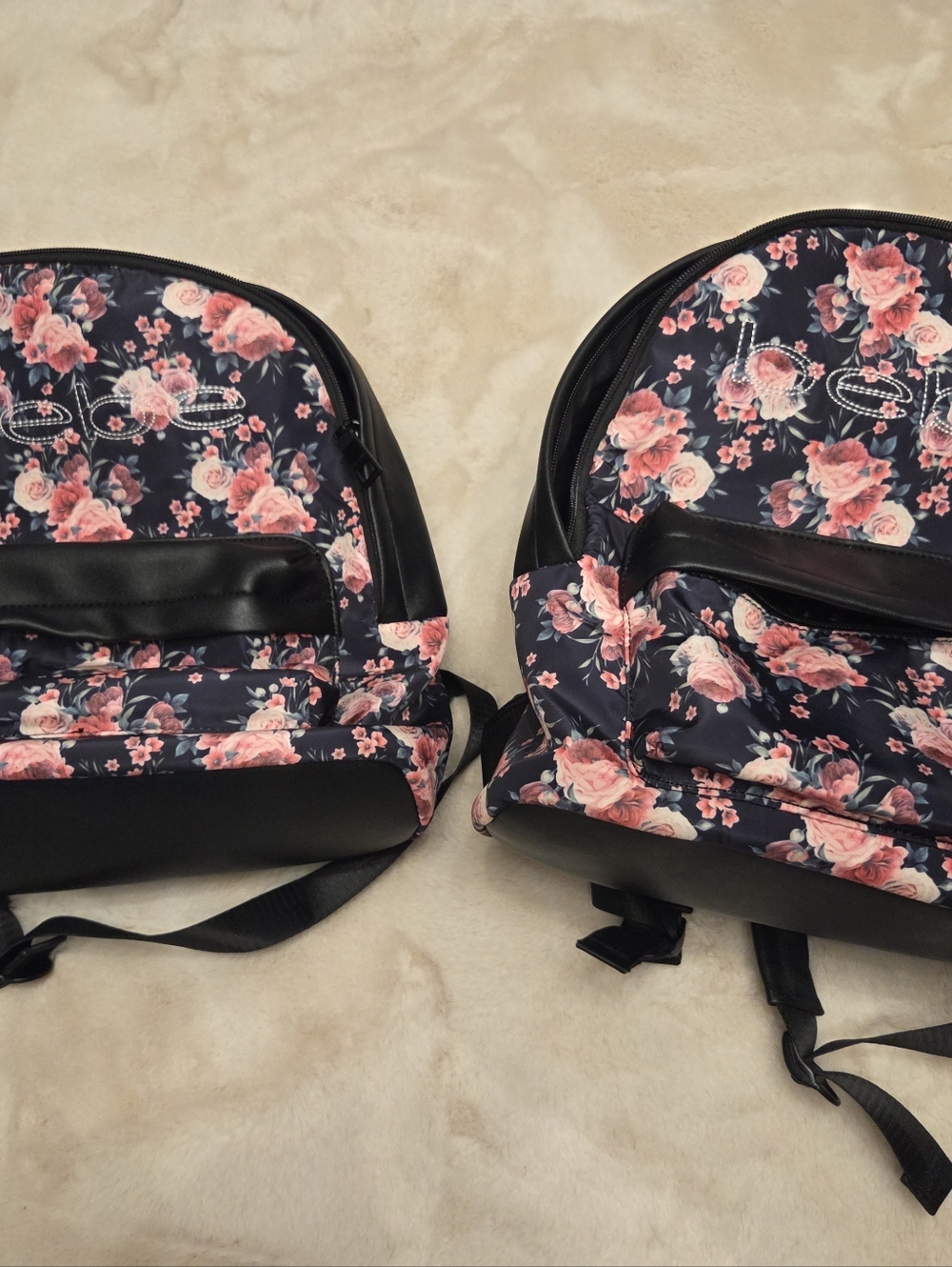 BEBE Floral and Pink Backpacks